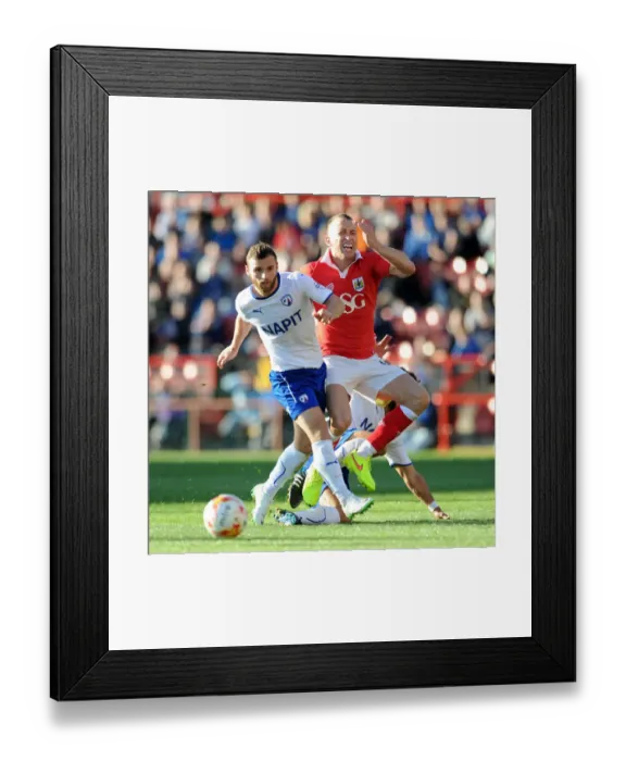 Framed Print : Bristol City vs Chesterfield: Wilbraham Foul in Sky Bet League One Clash at Ashton Gate Framed Print : Bristol City vs Chesterfield: Wilbraham Foul in Sky Bet League One Clash at Ashton Gate