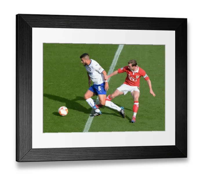 Framed Print : Bristol City vs Chesterfield: Wade Elliott Tackles Sam Morsy in Sky Bet League One Clash