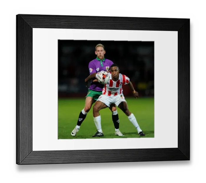 Framed Print : Bristol City's Scott Wagstaff Closes In on Cheltenham Town's Craig Braham-Barrett in Johnstone's Paint Trophy Clash