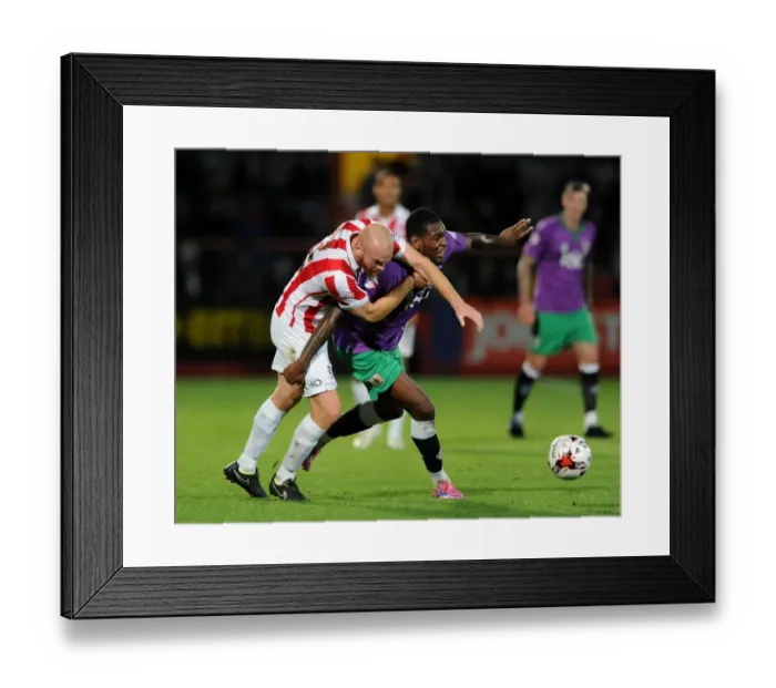 Framed Print : Jostling for Control: Taylor vs Emmanuel-Thomas in Cheltenham Town vs Bristol City Football Clash Framed Print : Jostling for Control: Taylor vs Emmanuel-Thomas in Cheltenham Town vs Bristol City Football Clash