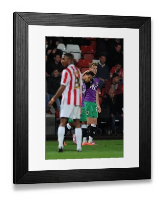 Framed Print : Korey Smith's Double: Bristol City Celebrates in Cheltenham Town's Abbey Business Stadium
