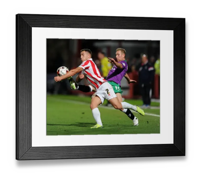 Framed Print : Scott Wagstaff Chases Down Lee Vaughan in Intense Johnstone's Paint Trophy Clash Framed Print : Scott Wagstaff Chases Down Lee Vaughan in Intense Johnstone's Paint Trophy Clash