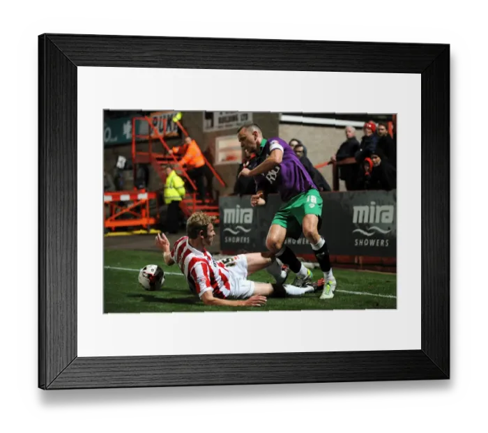 Framed Print : Aaron Wilbraham vs Jack Deaman: Intense Battle in Cheltenham Town vs Bristol City Football Match, October 2014 Framed Print : Aaron Wilbraham vs Jack Deaman: Intense Battle in Cheltenham Town vs Bristol City Football Match, October 2014