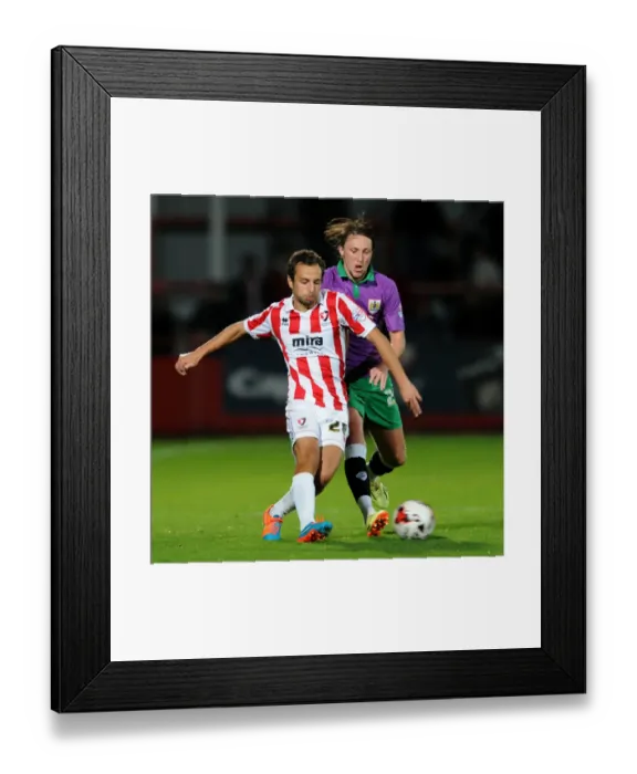 Framed Print : Bristol City's Luke Ayling Closes In on Cheltenham Town's Raffaele De Vita in Johnstone's Paint Trophy Clash Framed Print : Bristol City's Luke Ayling Closes In on Cheltenham Town's Raffaele De Vita in Johnstone's Paint Trophy Clash