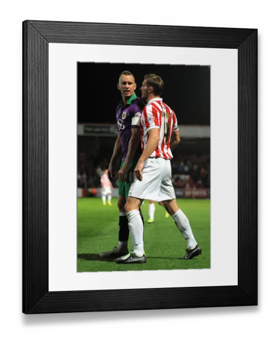 Framed Print : Aaron Wilbraham and Matt Taylor Clash in Intense Rivalry: Cheltenham Town vs. Bristol City, 08 / 10 / 2014 Framed Print : Aaron Wilbraham and Matt Taylor Clash in Intense Rivalry: Cheltenham Town vs. Bristol City, 08 / 10 / 2014