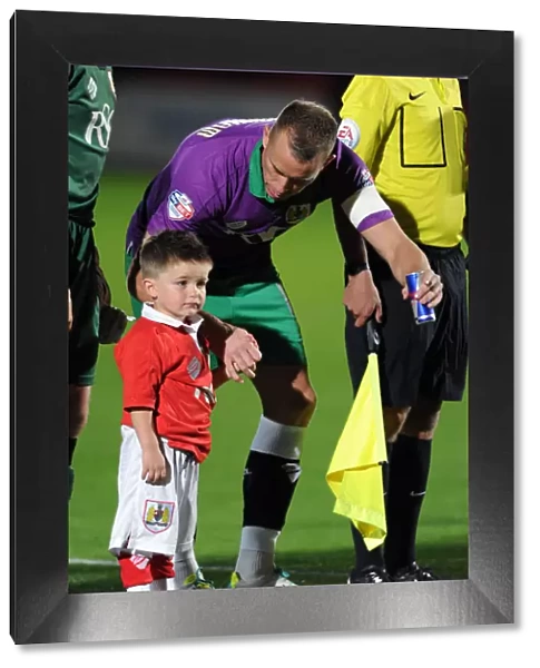 Aaron Wilbraham and Mascot Celebrate Bristol City's Victory over Cheltenham Town, October 8, 2014
