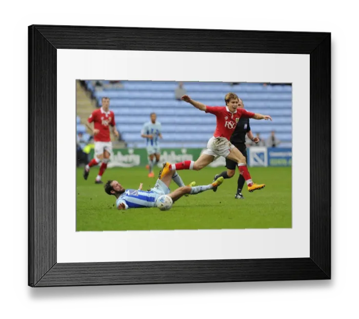 Framed Print : Bristol City vs Coventry City: Intense Moment as Luke Freeman is Tackled by James O'Brien Framed Print : Bristol City vs Coventry City: Intense Moment as Luke Freeman is Tackled by James O'Brien