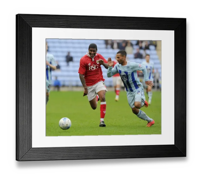 Framed Print : Battling for Control: Mark Little vs. Jordan Clarke in Sky Bet League One Clash Framed Print : Battling for Control: Mark Little vs. Jordan Clarke in Sky Bet League One Clash