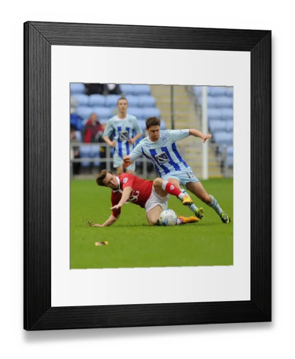 Framed Print : Battling for Supremacy: Freeman vs. Miller in Intense Sky Bet League One Clash