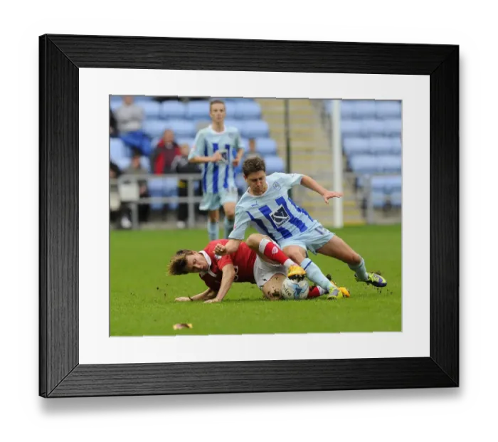 Framed Print : Battling for Control: Freeman vs. Miller in Sky Bet League One Clash