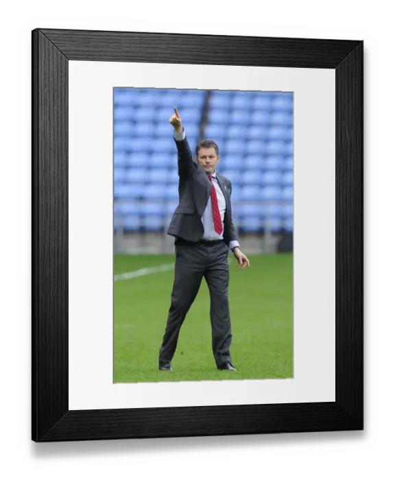 Framed Print : Steve Cotterill Salutes Coventry Fans: Triumphant Gesture at Ricoh Arena