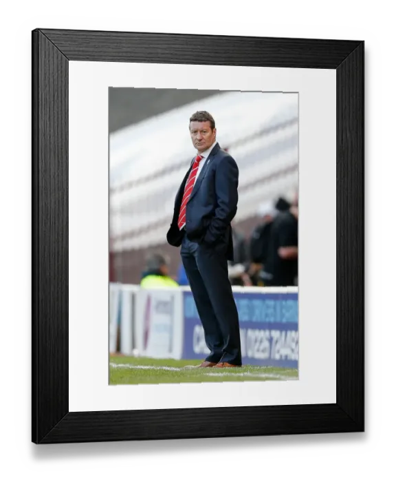 Framed Print : Danny Wilson Watches Tense Barnsley vs. Bristol City Clash at Oakwell Stadium, 2014 Framed Print : Danny Wilson Watches Tense Barnsley vs. Bristol City Clash at Oakwell Stadium, 2014