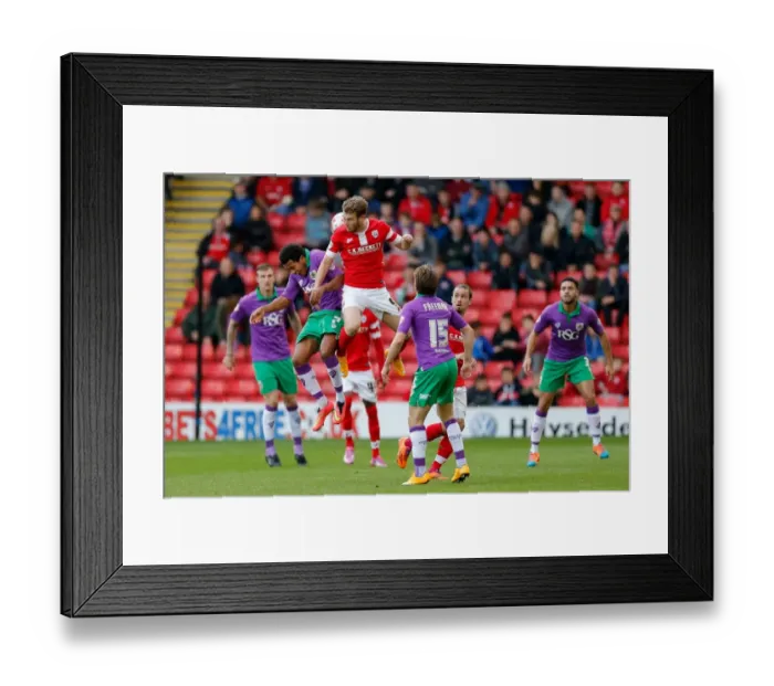 Framed Print : Bristol City's Korey Smith and Barnsley's Sam Winnall Battle for Height in Sky Bet League 1 Clash Framed Print : Bristol City's Korey Smith and Barnsley's Sam Winnall Battle for Height in Sky Bet League 1 Clash