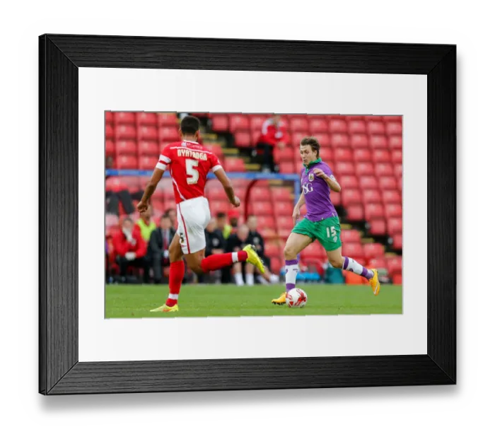 Framed Print : Barnsley vs. Bristol City: Luke Freeman Faces Off Against Lewin Nyatanga Framed Print : Barnsley vs. Bristol City: Luke Freeman Faces Off Against Lewin Nyatanga