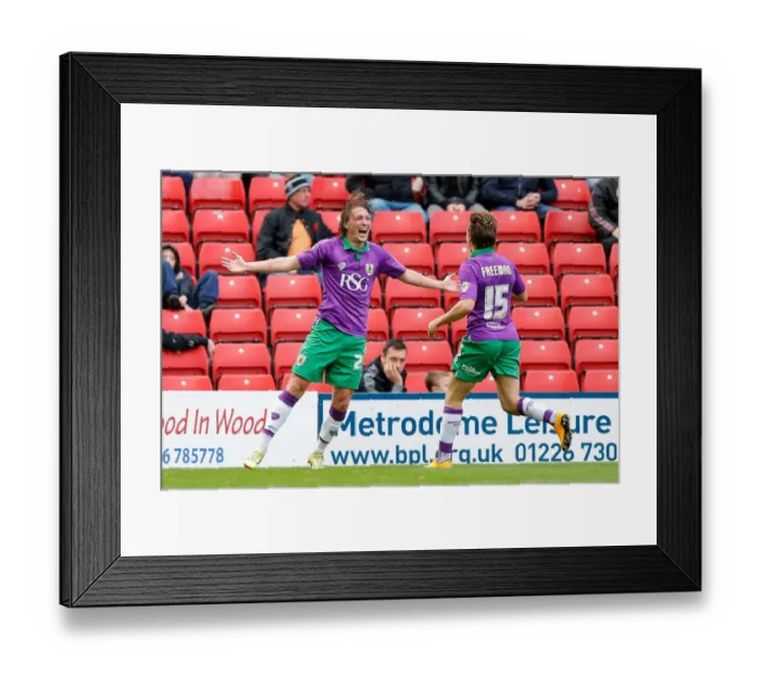 Framed Print : Luke Ayling Scores Early Goal for Bristol City Against Barnsley at Oakwell Stadium (2014) Framed Print : Luke Ayling Scores Early Goal for Bristol City Against Barnsley at Oakwell Stadium (2014)