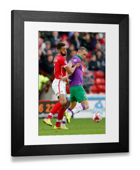 Framed Print : Bristol City's Aaron Wilbraham Faces Off Against Barnsley's Lewin Nyatanga in Sky Bet League 1 Clash Framed Print : Bristol City's Aaron Wilbraham Faces Off Against Barnsley's Lewin Nyatanga in Sky Bet League 1 Clash