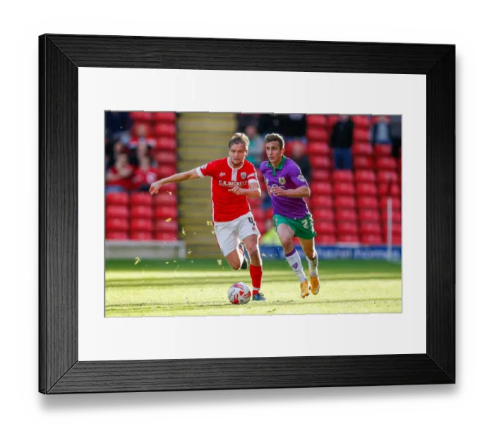 Framed Print : Barnsley vs. Bristol City: Joe Bryan Faces Off Against Luke Berry