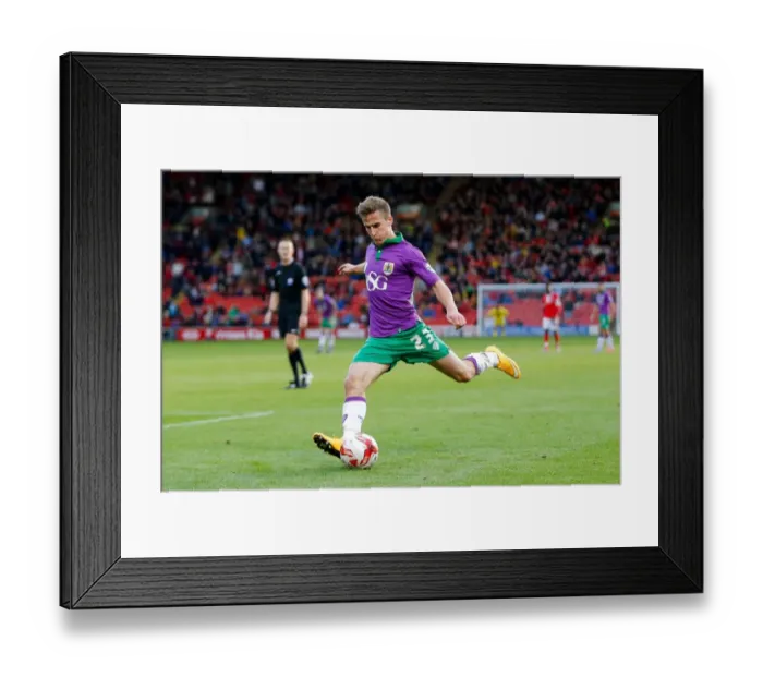 Framed Print : Bristol City's Joe Bryan in Action against Barnsley, October 2014
