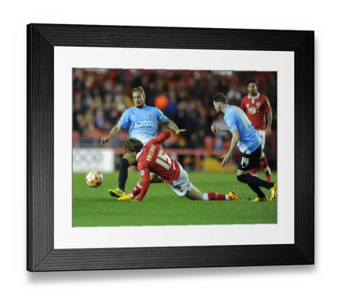 Framed Print : Bristol City vs Bradford City: Intense Moment as Luke Freeman Challenges Andrew Davies