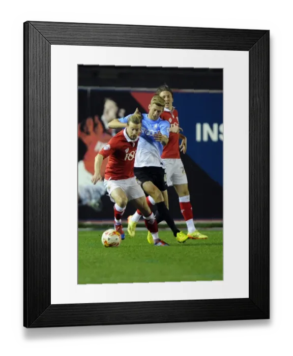 Framed Print : Battling for Supremacy: Wade Elliott vs. Jonathan Stead in the Intense Clash between Bristol City and Bradford City Framed Print : Battling for Supremacy: Wade Elliott vs. Jonathan Stead in the Intense Clash between Bristol City and Bradford City
