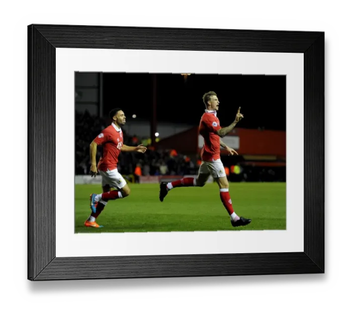 Framed Print : Aden Flint and Derrick Williams Celebrate Double Strike: Bristol City's Victory Moment vs. Bradford City (October 2014) Framed Print : Aden Flint and Derrick Williams Celebrate Double Strike: Bristol City's Victory Moment vs. Bradford City (October 2014)