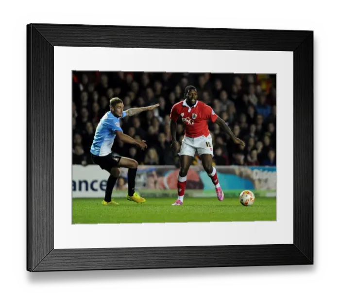 Framed Print : Bristol City's Jay Emmanuel-Thomas Dribbles Past Bradford City's Gary Liddle in Sky Bet League One Clash Framed Print : Bristol City's Jay Emmanuel-Thomas Dribbles Past Bradford City's Gary Liddle in Sky Bet League One Clash