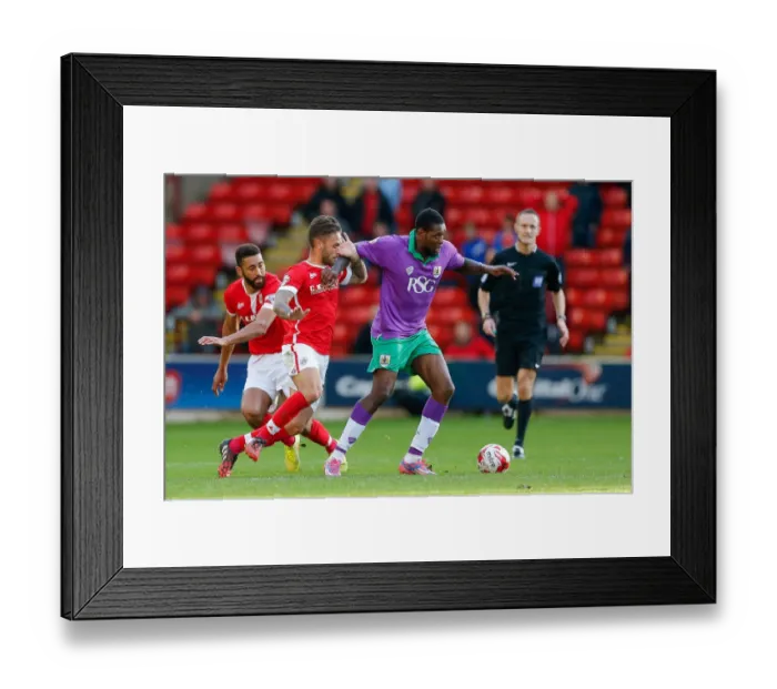 Framed Print : Jay Emmanuel-Thomas vs Barnsley Defense: Intense Moment at Oakwell Stadium, 2014 Framed Print : Jay Emmanuel-Thomas vs Barnsley Defense: Intense Moment at Oakwell Stadium, 2014