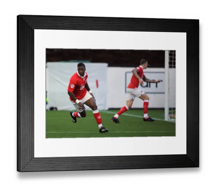 Framed Print : Euphoric Moment: Kieran Agard's Thrilling Goal Celebration vs Oldham Athletic (Sky Bet League One, 2014) Framed Print : Euphoric Moment: Kieran Agard's Thrilling Goal Celebration vs Oldham Athletic (Sky Bet League One, 2014)