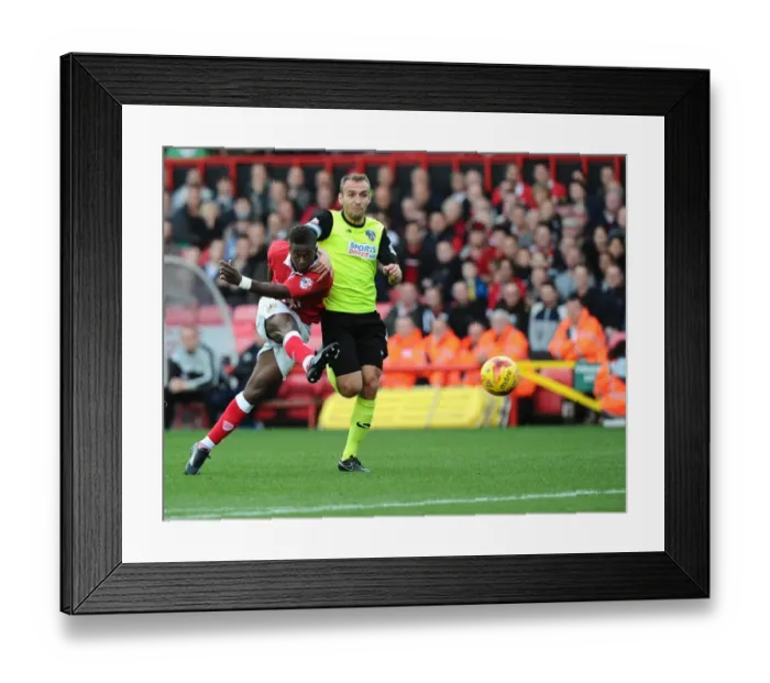 Framed Print : Bristol City's Kieran Agard Thwarted by Oldham Athletic's Paul Rachubka Framed Print : Bristol City's Kieran Agard Thwarted by Oldham Athletic's Paul Rachubka