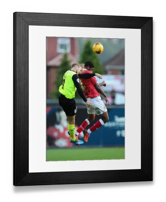 Framed Print : Battling for the High Ball: Mark Little vs. James Dayton - Sky Bet League One Clash Framed Print : Battling for the High Ball: Mark Little vs. James Dayton - Sky Bet League One Clash