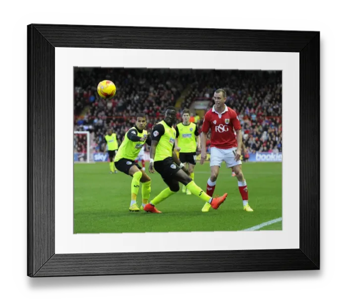 Framed Print : Mid-Air Magic: Wilbraham's Flick Against Oldham, Sky Bet League One, 2014