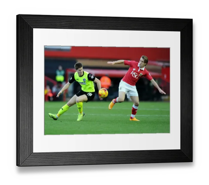 Framed Print : Battling for Supremacy: Luke Freeman vs. Daniel Philliskirk - A Football Showdown at Ashton Gate