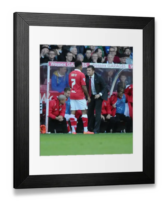 Framed Print : Steve Cotterill Coaches Korey Smith Before Scoring Free Kick for Bristol City