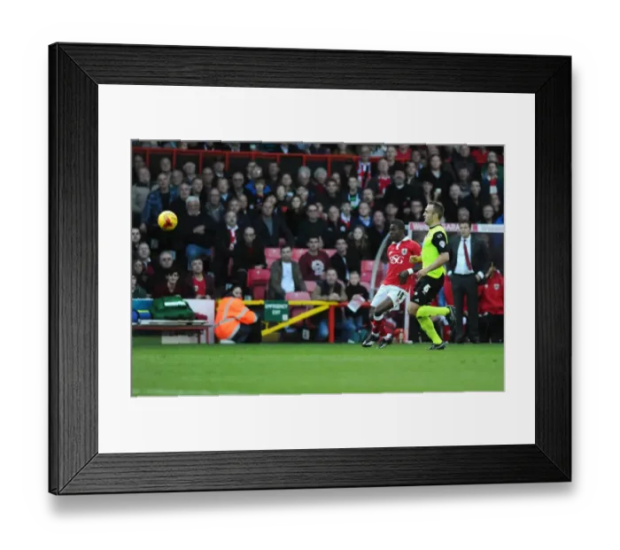 Framed Print : Bristol City's Kieran Agard Attempts Epic Lob Over Oldham Athletic's Paul Rachubka Framed Print : Bristol City's Kieran Agard Attempts Epic Lob Over Oldham Athletic's Paul Rachubka