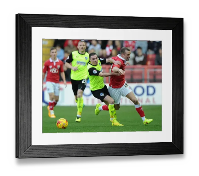 Framed Print : Battling for Supremacy: Wilbraham vs Jones in the Intense Bristol City vs Oldham Athletic Clash, Sky Bet League One, 2014 Framed Print : Battling for Supremacy: Wilbraham vs Jones in the Intense Bristol City vs Oldham Athletic Clash, Sky Bet League One, 2014