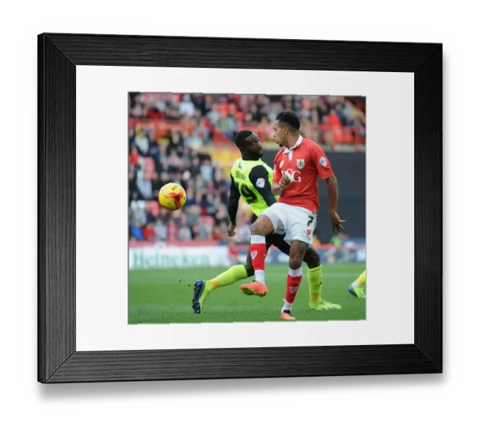 Framed Print : Intense Moment: Korey Smith vs. Jabo Ibehre in Bristol City's Battle against Oldham Athletic Framed Print : Intense Moment: Korey Smith vs. Jabo Ibehre in Bristol City's Battle against Oldham Athletic