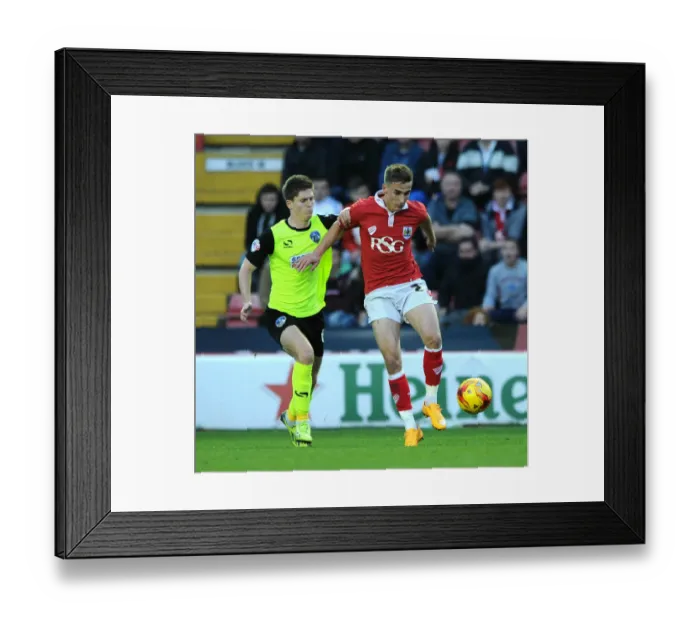 Framed Print : Action-Packed Moment: Joe Bryan in Full Throttle for Bristol City, November 2014 - Football Match