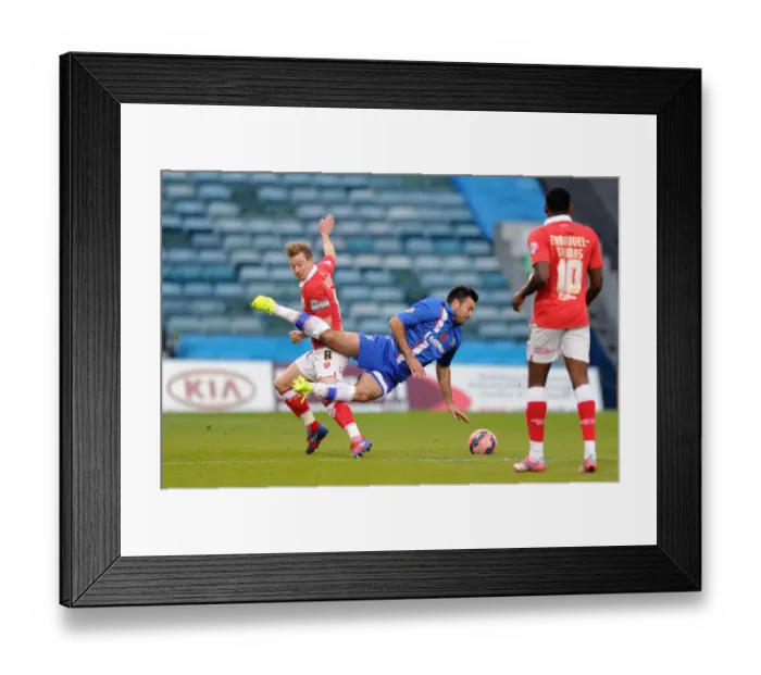 Framed Print : Wade Elliott Fouls Michael Doughty: Intense Moment in Gillingham vs. Bristol City FA Cup Clash
