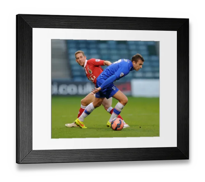 Framed Print : Bristol City vs Gillingham: Intense Moment as Scott Wagstaff and Doug Loft Clash in FA Cup Match Framed Print : Bristol City vs Gillingham: Intense Moment as Scott Wagstaff and Doug Loft Clash in FA Cup Match