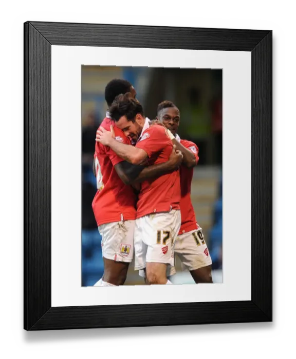 Framed Print : Bristol City's Triumph: Cunningham, Emmanuel-Thomas, and Agard Celebrate Goal in FA Cup Match against Gillingham Framed Print : Bristol City's Triumph: Cunningham, Emmanuel-Thomas, and Agard Celebrate Goal in FA Cup Match against Gillingham