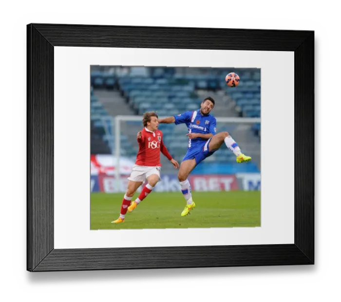 Framed Print : Bristol City's Luke Freeman Closes In on Gillingham's Michael Doughty during FA Cup Clash Framed Print : Bristol City's Luke Freeman Closes In on Gillingham's Michael Doughty during FA Cup Clash