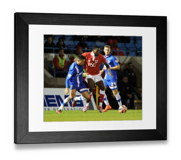 Framed Print : Bristol City's Jay Emmanuel-Thomas vs Gillingham's Joe Martin: FA Cup Clash at Priestfield Stadium (November 8, 2014)
