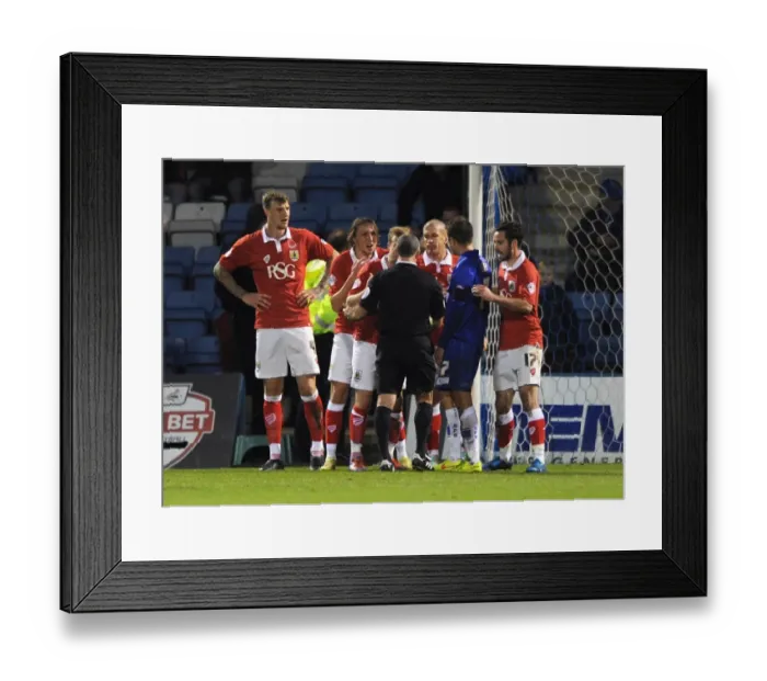 Framed Print : Protesting the Penalty: Bristol City Players Show Disagreement at Priestfield Stadium Framed Print : Protesting the Penalty: Bristol City Players Show Disagreement at Priestfield Stadium
