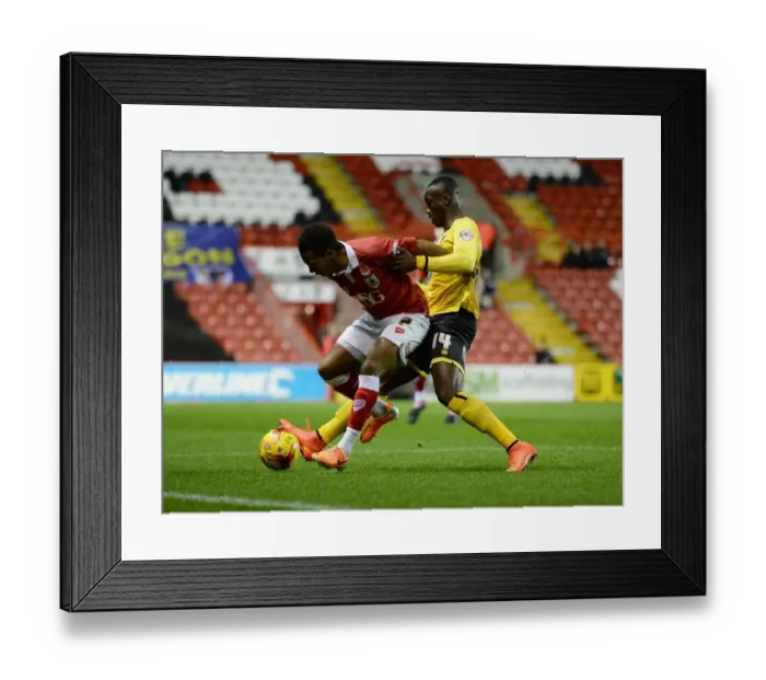 Framed Print : Battling for Supremacy: Korey Smith vs. Adebayo Azeez in the Johnstone's Paint Trophy Clash between Bristol City and AFC Wimbledon Framed Print : Battling for Supremacy: Korey Smith vs. Adebayo Azeez in the Johnstone's Paint Trophy Clash between Bristol City and AFC Wimbledon