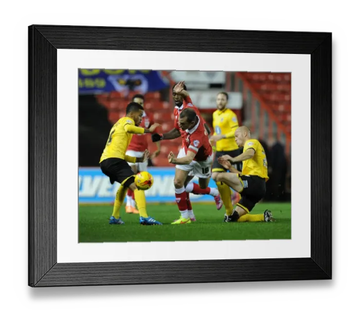 Framed Print : Aaron Wilbraham Fouled by Adam Barrett in Johnstone's Paint Trophy Match: Bristol City vs AFC Wimbledon