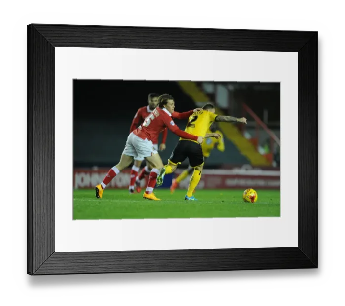 Framed Print : Bristol City vs AFC Wimbledon: Karleigh Osborne Holds Back Barry Fuller