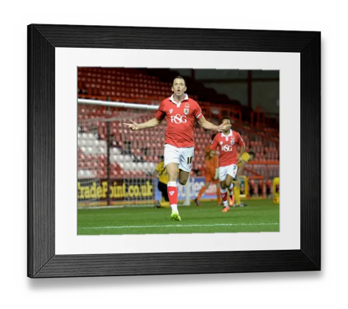 Framed Print : Aaron Wilbraham's Winning Goal Celebration: Bristol City Claims Johnstone's Paint Trophy Victory over AFC Wimbledon