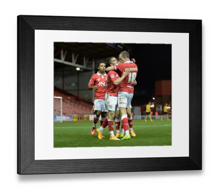 Framed Print : Jubilant Moment: Wilbraham and Bryan's Victory Celebration after Bristol City's Win against AFC Wimbledon