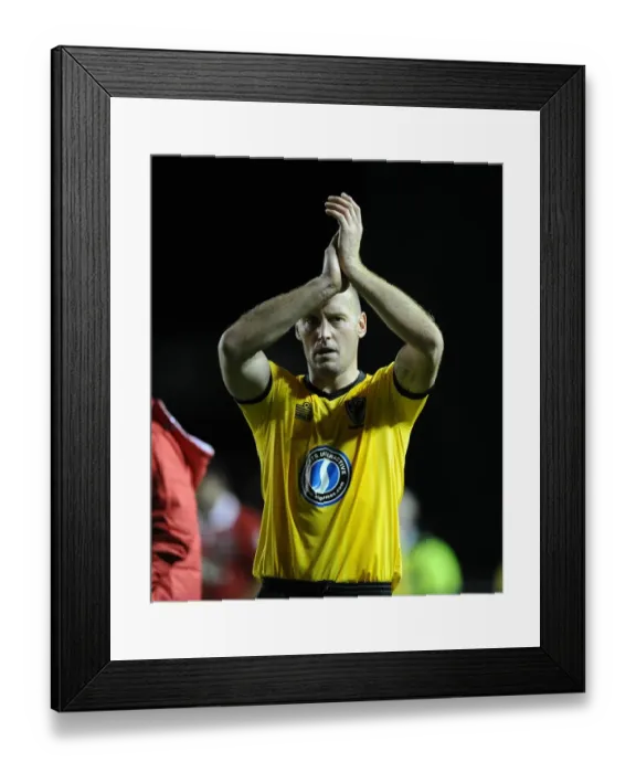 Framed Print : Bristol City's Adam Barrett Engages Traveling Fans at Ashton Gate Framed Print : Bristol City's Adam Barrett Engages Traveling Fans at Ashton Gate