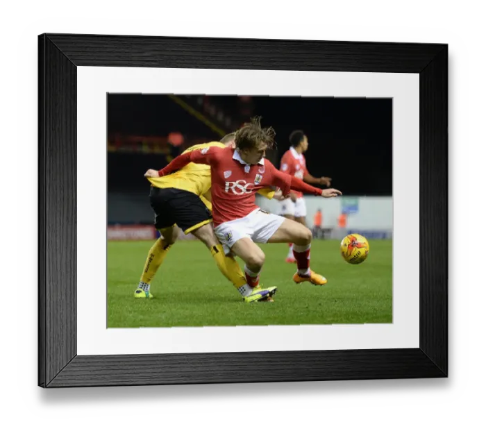 Framed Print : Bristol City vs AFC Wimbledon: Tom Beere Fouls Luke Freeman in Johnstone's Paint Trophy Clash
